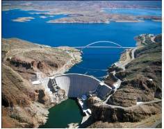 Seepage  - (The slow escape of a liquid or gas through porous material or small holes.)