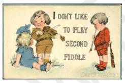 Play second fiddle - Have a subordinate role to someone or something.