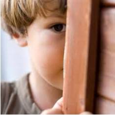 Coy  - Shy or pretending to be shy and innocent.