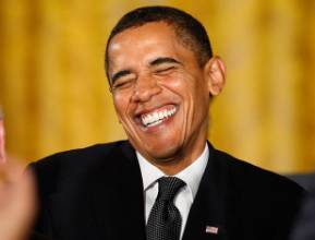 Grin  - A broad smile.