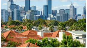 Suburb  - An outlying district of a city, especially a residential one.