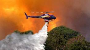 Douse  - Pour a liquid over /extinguish (a fire or light).