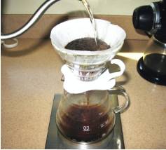 Percolate  - (Of a liquid or gas) filter gradually through a porous surface or substance.