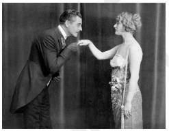 Genteel  - Characterized by exaggerated or affected politeness, refinement, or respectability.