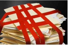 Red tape - Excessive bureaucracy or adherence to official rules and formalities.