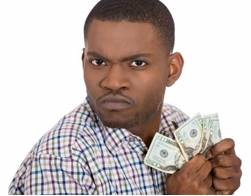 Stingy  - Unwilling to spend money: