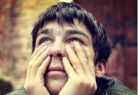 Beleagured  - Having a lot of problems or difficulties: