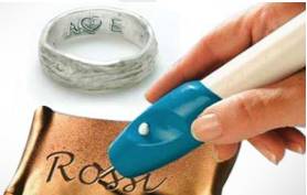 Engrave  - Cut or carve (a text or design) on the surface of a hard object.