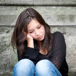 Grim - Worried and serious or sad