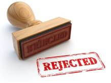 Veto  - To refuse to allow something.