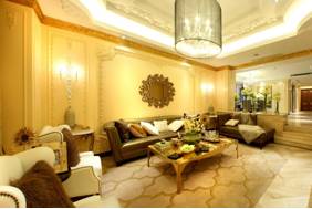 Grandiose  - Extravagantly or pretentiously imposing in appearance or style.