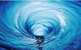 Vortex  - A mass of air or water that spins around very fast and pulls objects into its empty centre.