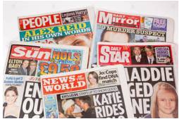 Tabloid  - A tabloid is a newspaper that has small pages, short articles, and lots of photographs.