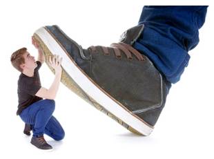 Lumpen  - Belonging to the class of people of low social or economic rank.