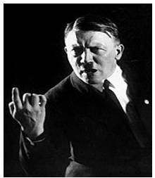 Demagogue  - A leader who makes use of popular prejudices and false claims and promises in order to gain power.