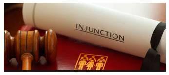 Injunction  - An authoritative warning or order.