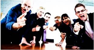 Revile  - Criticize in an abusive or angrily insulting manner.