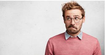 Sceptical  - Meaning: not easily convinced; having doubts or reservations.