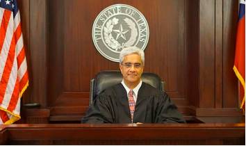 Incumbent  - Meaning: the holder of an office or post.