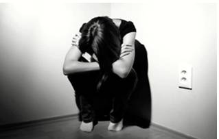 Dismal  - Meaning: causing a mood of gloom or depression.