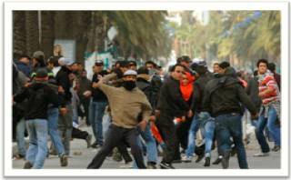 Insurrection  - Meaning: a violent uprising against an authority or government.