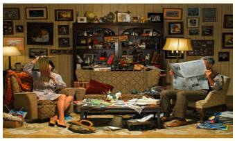Cluttered - Meaning: messy or disorderly.
