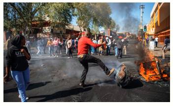 Turbulent  - Meaning: In which there is a lot of sudden change, confusion, disagreement and sometimes violence.