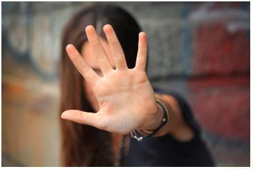 Rebuff  - Meaning: To refuse a friendly offer, request or suggestion in an unkind way.