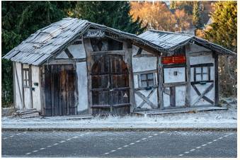 Decrepit  - Meaning: (of a thing or person) very old and not in good condition or health.