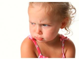 Sullen  - Meaning: In a bad mood and not speaking, either on a particular occasion or because it is part of your character.