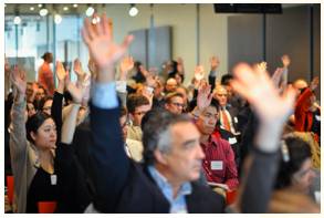 Unanimously  - Meaning - Without opposition; with the agreement of all people involved.