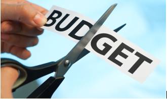 Retrenchment  - Meaning- The policy of spending less money; a deliberate reduction of costs.