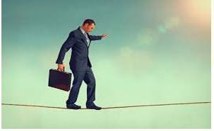 Falter  - Meaning- To become weaker or less effective.