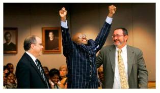 Exonerate  - Meaning - (of an official body) absolve (someone) from blame for a fault or wrongdoing.