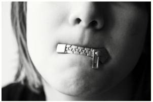Reticence  - Meaning- A dislike of telling people about things.