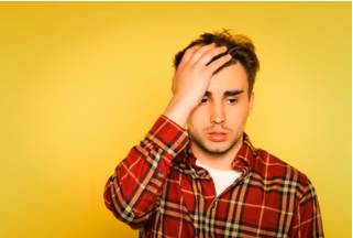 Compunction  - A guilty feeling about doing something.