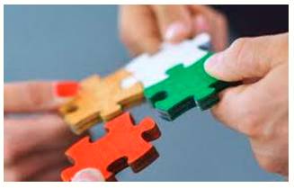 Piecemeal  - Done or happening gradually at different times and often in different ways, rather than carefully planned at the beginning.