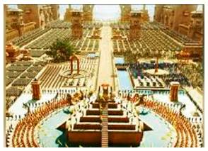Grandiose  - Conceived on a very grand or ambitious scale.