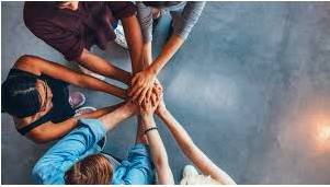 Camaraderie  - Mutual trust and friendship among people who spend a lot of time together.