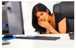 Discreetly  - In a careful and prudent manner, especially in order to keep something confidential or to avoid embarrassment.