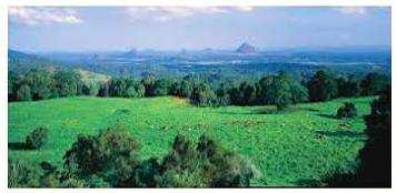 Hinterland  - The remote areas of a country away from the coast or the banks of major rivers.