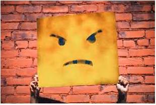 Rancor  - Bitterness or resentfulness, especially when long standing.