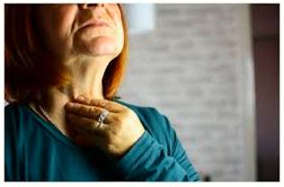 Hoarse  - (of a person's voice) sounding rough and harsh, typically as the result of a sore throat or of shouting.
