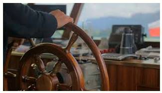 Steer  - Guide the movement or course of.