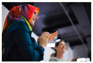 Prompt  - Encourage (a hesitating speaker) to say something.