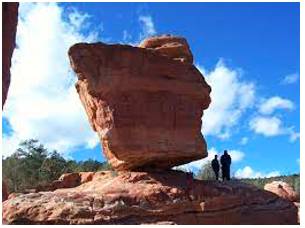 Boulder  - A very large rock which has been shaped by water or the weather.