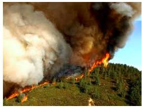 Conflagration  - An extensive fire which destroys a great deal of land or property.