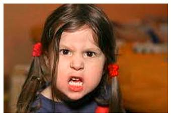 Indignant - Feeling or showing anger or annoyance at what is perceived as unfair treatment.