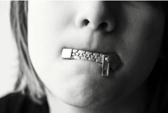 Reticence  - A dislike of telling people about things.