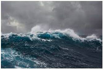 Tempestuous  - Characterized by strong and turbulent or conflicting emotion.